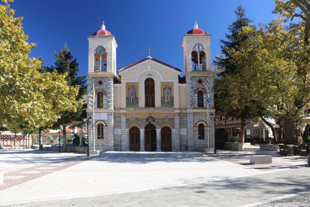 Kalavrita - Cathedral of Taxiarches with twin clock towers